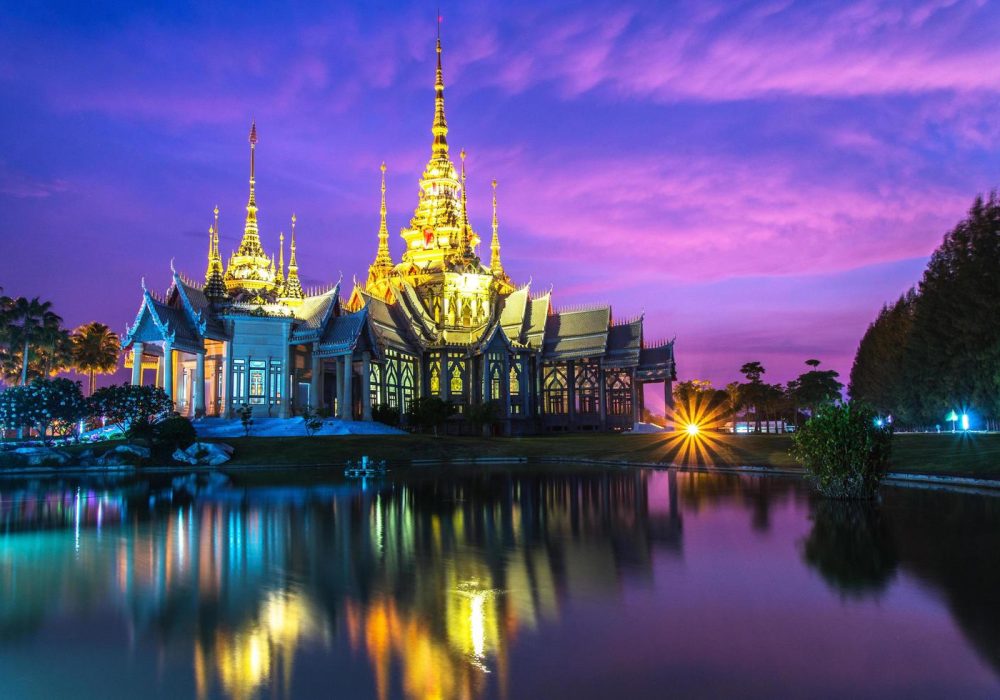 beautiful-temple-thailand-dramatic-colorful-sky-twilight-sunset-shadow-on-water-reflection-with-light-free-photo